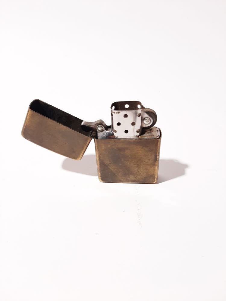 Zippo lighter brass klasik 1992 — kode K 19 di bagian bawah